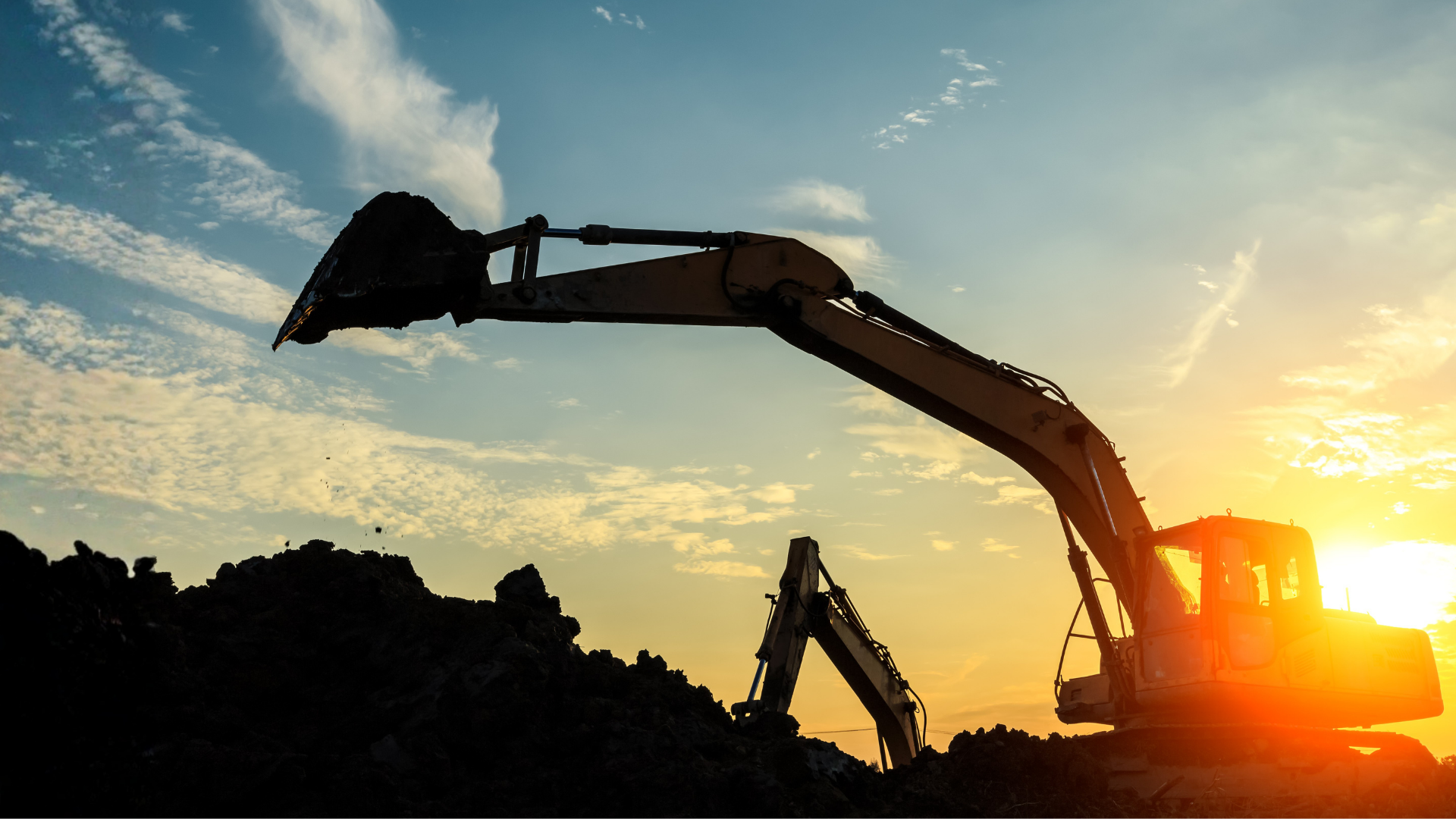 Excavator digging to install a septic system